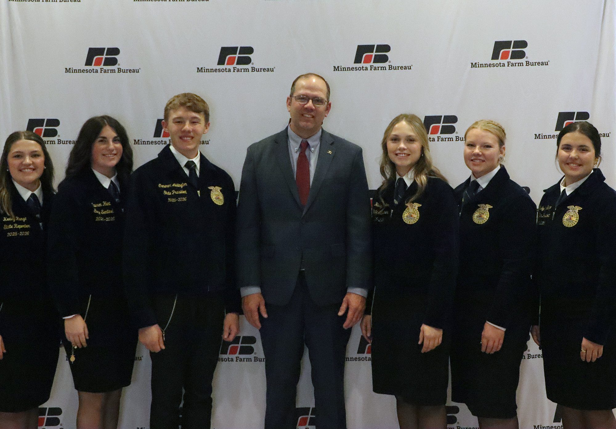 President Dan Glessing posed with state FFA officers